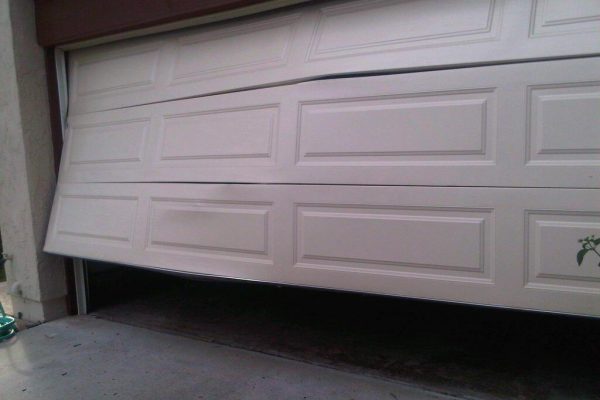 How To Fix A Dent In Your Garage Door