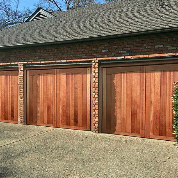 Side-hinged garage doors