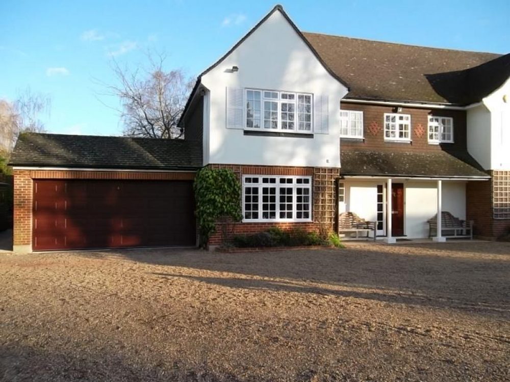 CARTECK ROSEWOOD PANELLED SECTIONAL GARAGE, OXSHOTT 1