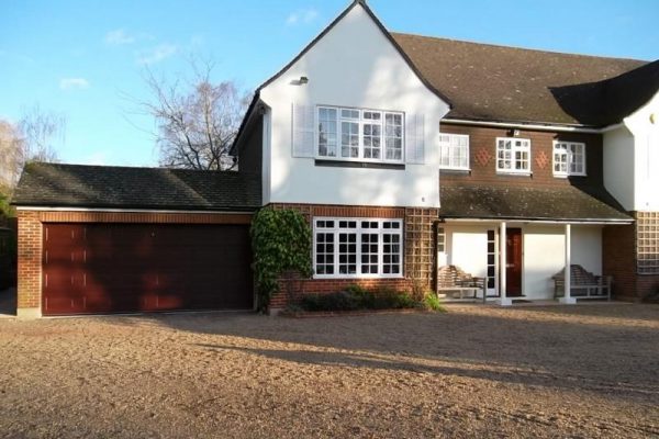 CARTECK ROSEWOOD PANELLED SECTIONAL GARAGE, OXSHOTT