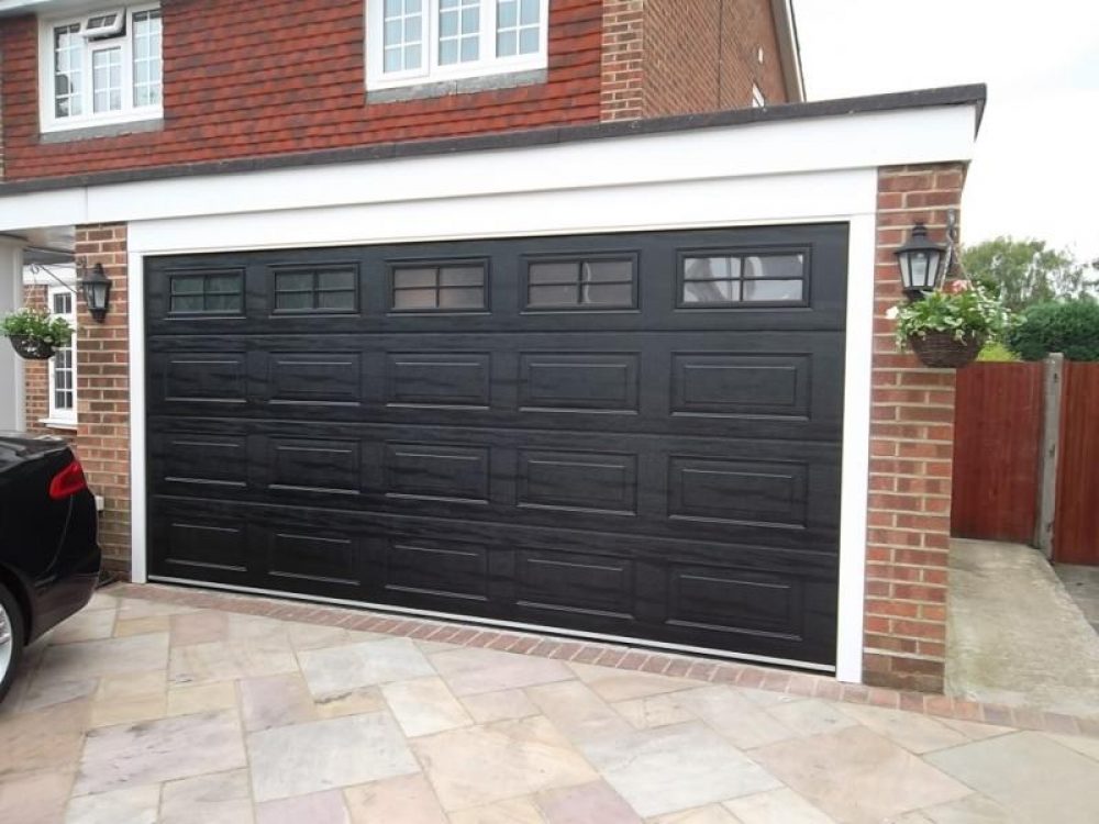 CARTECK SECTIONAL GARAGE DOOR WITH WINDOWS FITTED IN HASLEMERE 1