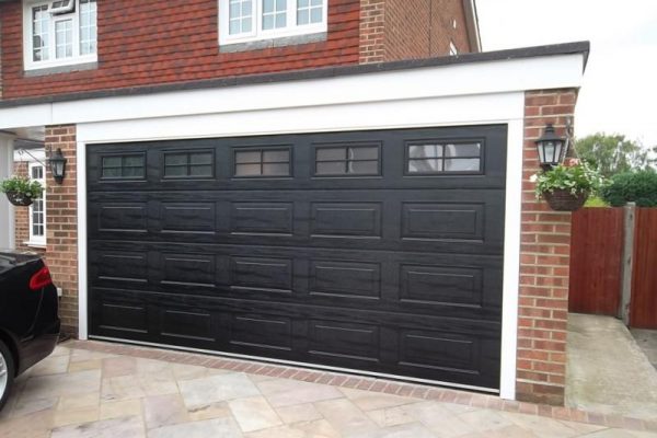 CARTECK SECTIONAL GARAGE DOOR WITH WINDOWS FITTED IN HASLEMERE