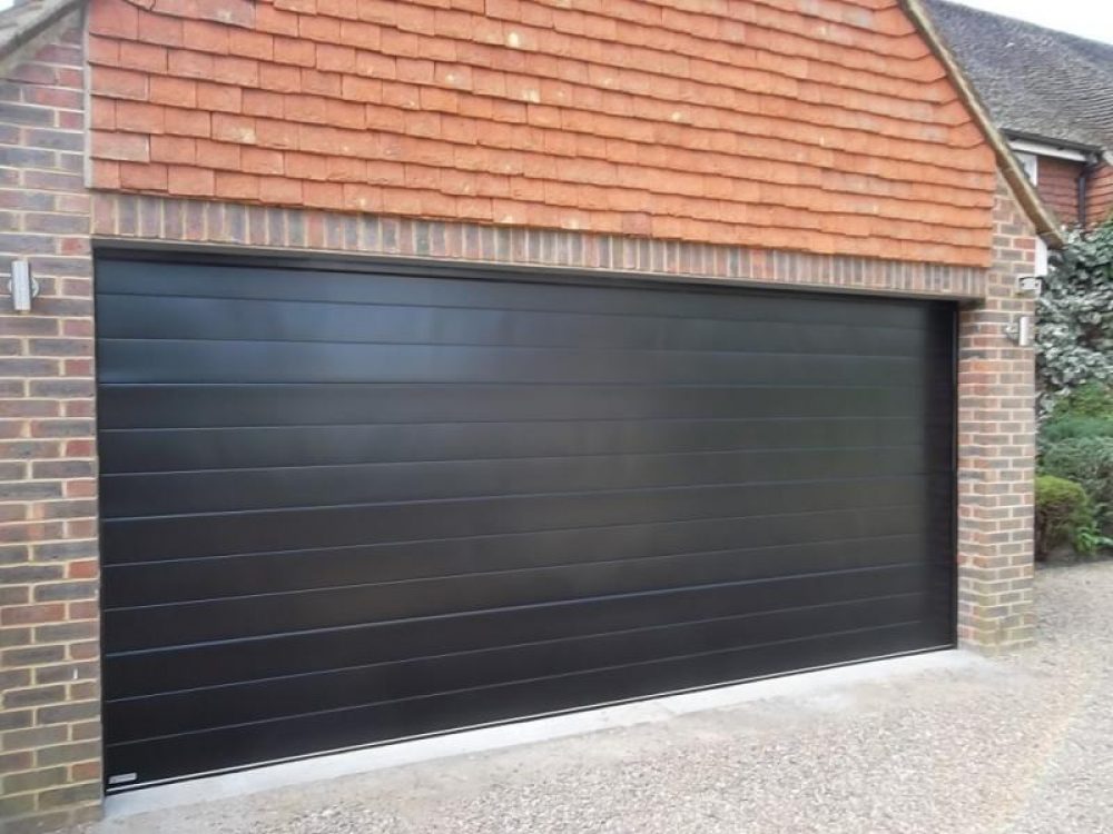 GLIDEROL SMOOTH RIBBED SECTIONAL DOOR FULLY FINISHED IN BLACK, ASCOT 1