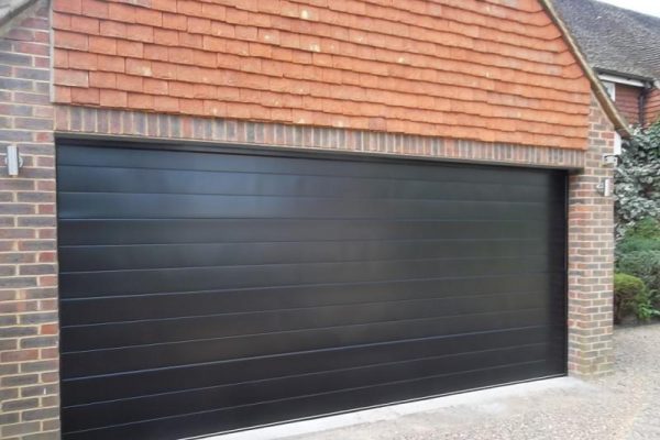 GLIDEROL SMOOTH RIBBED SECTIONAL DOOR FULLY FINISHED IN BLACK, ASCOT