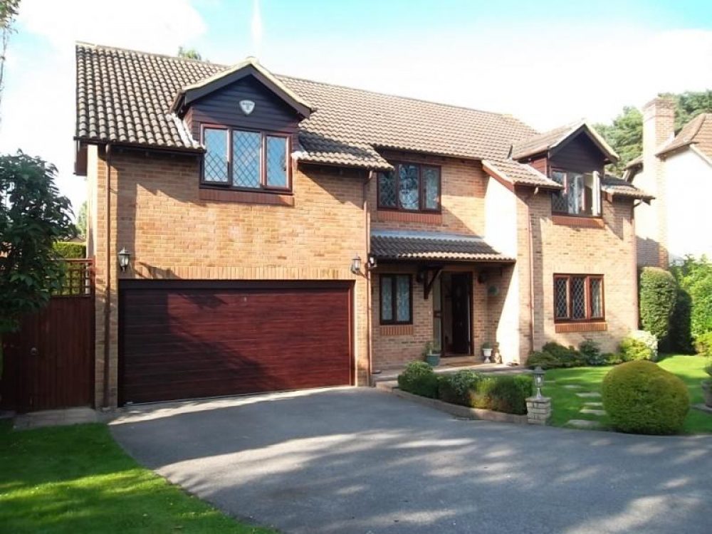 Gliderol Sectional Door, in Rosewood, fitted in Gerrards Cross 1