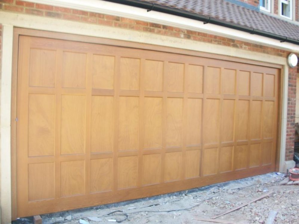 CEDAR TIMBER ELECTRIC DOORS FITTED IN WALTON ON THAMES, SURREY 1