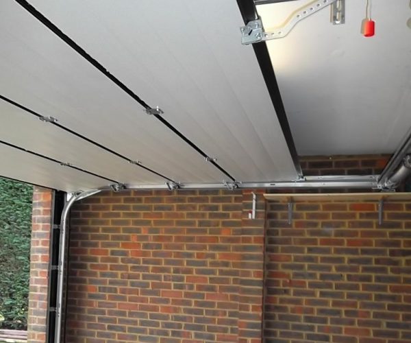 GLIDEROL SMOOTH RIBBED SECTIONAL DOOR FULLY FINISHED IN BLACK, ASCOT 2