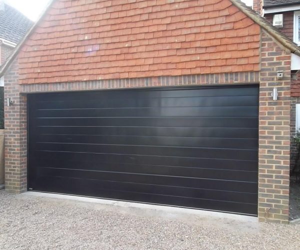 GLIDEROL SMOOTH RIBBED SECTIONAL DOOR FULLY FINISHED IN BLACK, ASCOT 7
