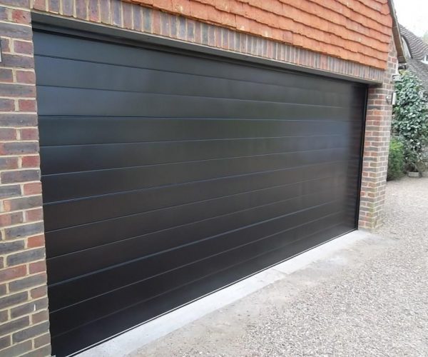 GLIDEROL SMOOTH RIBBED SECTIONAL DOOR FULLY FINISHED IN BLACK, ASCOT 8