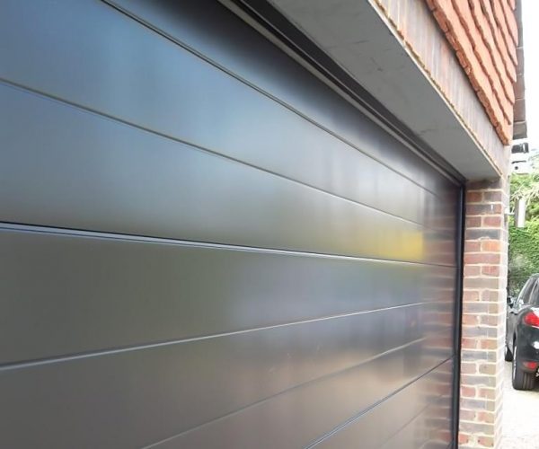 GLIDEROL SMOOTH RIBBED SECTIONAL DOOR FULLY FINISHED IN BLACK, ASCOT 9