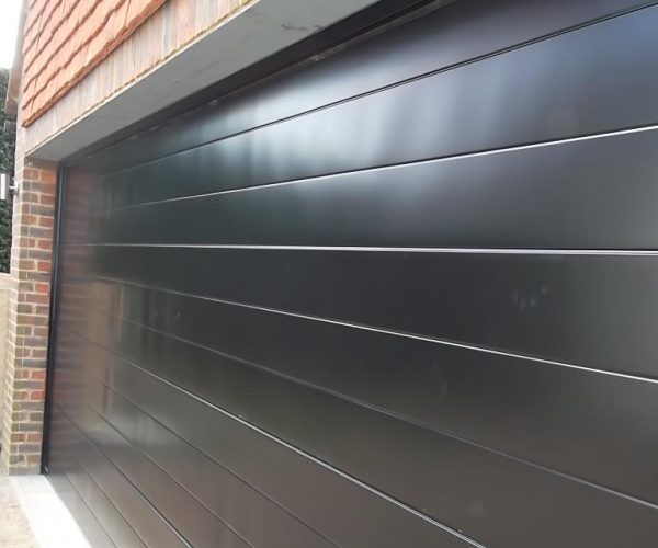 GLIDEROL SMOOTH RIBBED SECTIONAL DOOR FULLY FINISHED IN BLACK, ASCOT 10