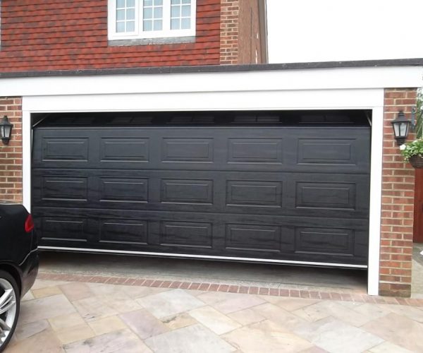 CARTECK SECTIONAL GARAGE DOOR WITH WINDOWS FITTED IN HASLEMERE 5
