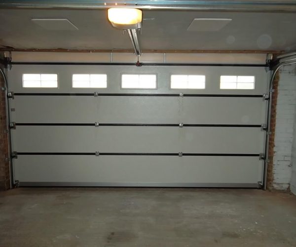 CARTECK SECTIONAL GARAGE DOOR WITH WINDOWS FITTED IN HASLEMERE 6