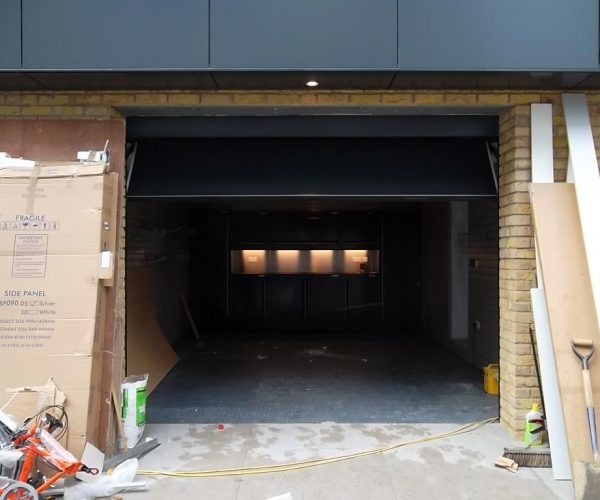 CARTECK SECTIONAL GARAGE DOOR FITTED TO THE WATER TOWER, KENSINGTON 6