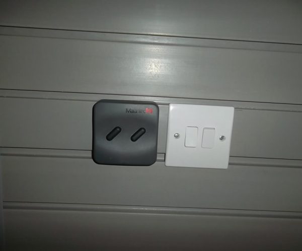 CARTECK SECTIONAL GARAGE DOOR FITTED TO THE WATER TOWER, KENSINGTON 7