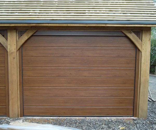 3 CARTECK SECTIONAL DOORS IN DARK OAK FITTED CHILWORTH, SURREY 2