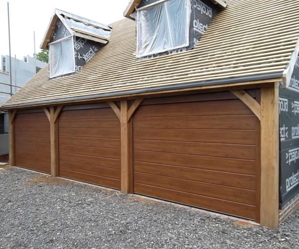 3 CARTECK SECTIONAL DOORS IN DARK OAK FITTED CHILWORTH, SURREY 8