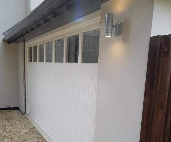 CEDAR TIMBER GARAGE DOOR WITH WINDOWS FITTED IN GUILDFORD 3