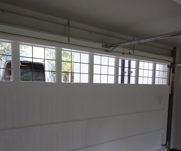 CEDAR TIMBER GARAGE DOOR WITH WINDOWS FITTED IN GUILDFORD 6