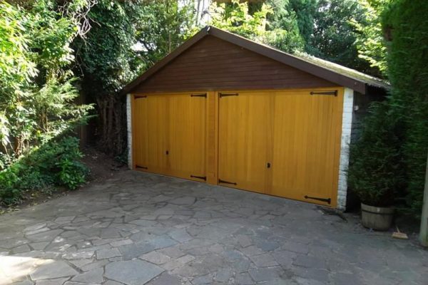 2 TIMBER CEDAR DOORS FITTED IN CHOBHAM, SURREY