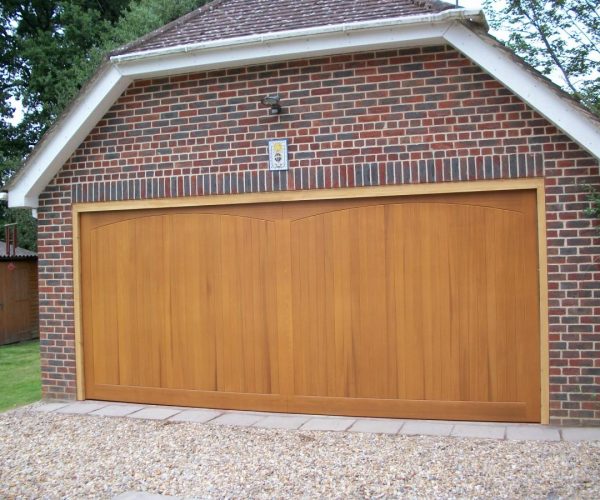 SOLID CEDAR TIMBER GARAGE DOOR FITTED IN LEATHERHEAD, SURREY 2