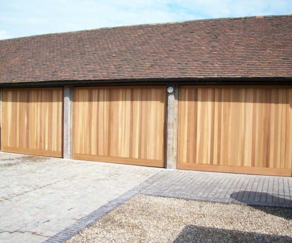 3 TIMBER CEDAR GARAGE DOORS FITTED HINDHEAD, HAMPSHIRE 2
