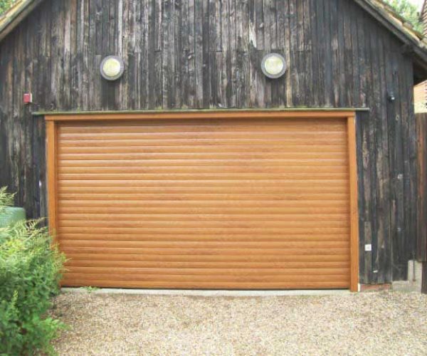 SECEUROGLIDE ROLLER DOOR IN GOLDEN OAK, DORKING SURREY 3