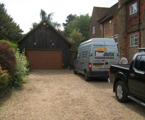 SECEUROGLIDE ROLLER DOOR IN GOLDEN OAK, DORKING SURREY 2