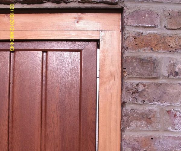 CARDALE STEEL GARAGE DOORS FINISHED IN GOLDEN OAK, COBHAM 5