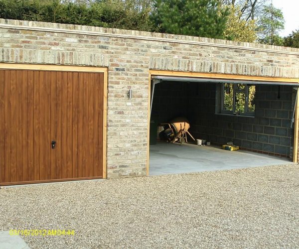 CARDALE STEEL GARAGE DOORS FINISHED IN GOLDEN OAK, COBHAM 6