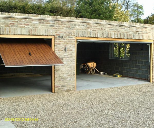 CARDALE STEEL GARAGE DOORS FINISHED IN GOLDEN OAK, COBHAM 7