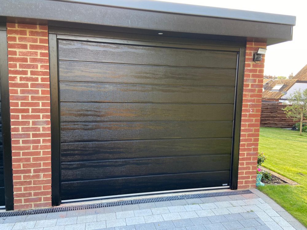 3 New Carteck Sectionals in Wood Grain Black 1