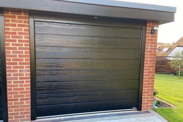 3 New Carteck Sectionals in Wood Grain Black