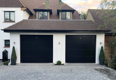 Electric sectional garage door