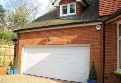 Garage door with access