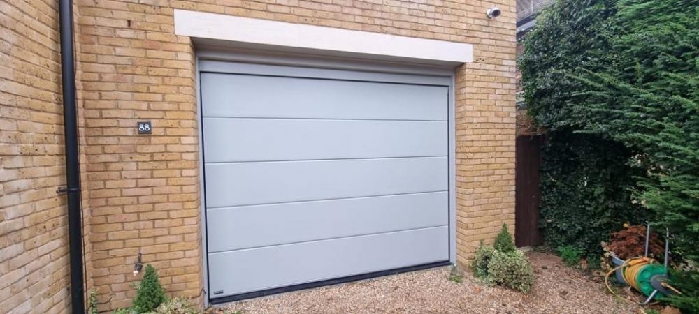 Insulated Sectional Garage Door for Home gym 1