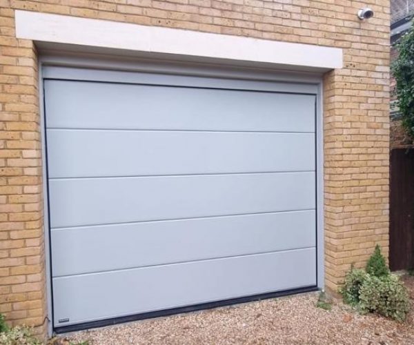 Insulated Sectional Garage Door for Home gym 2