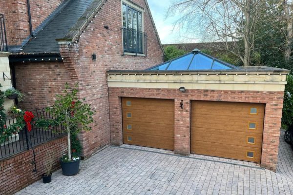 Two Timber Effect Sectional Garage Doors