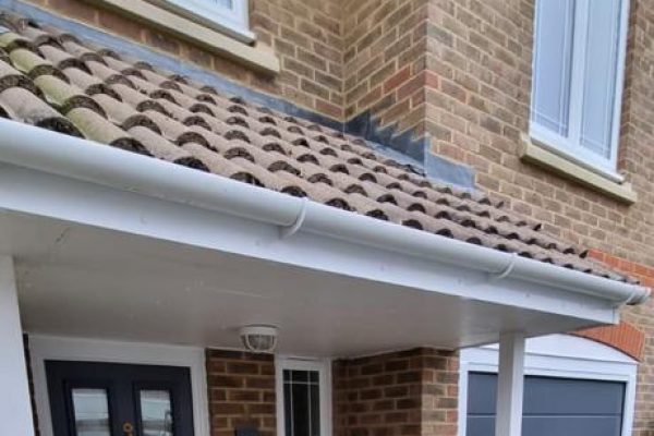 Blue Sectional Garage Door with matching front door