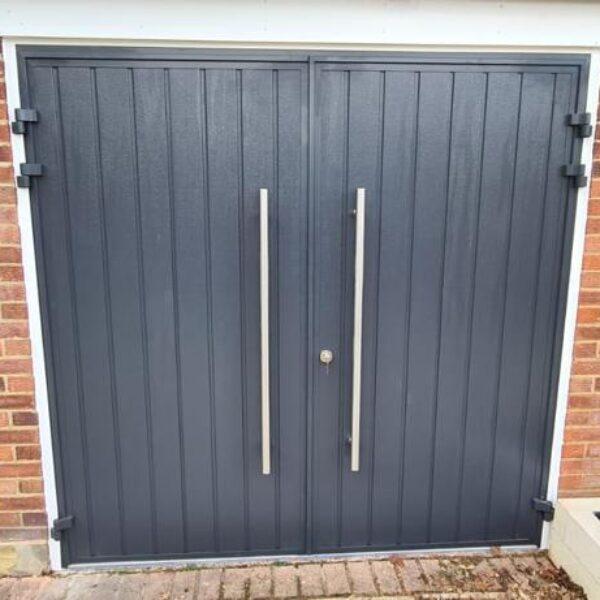 Side hinged garage doors
