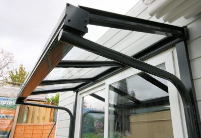 Glass over door canopy