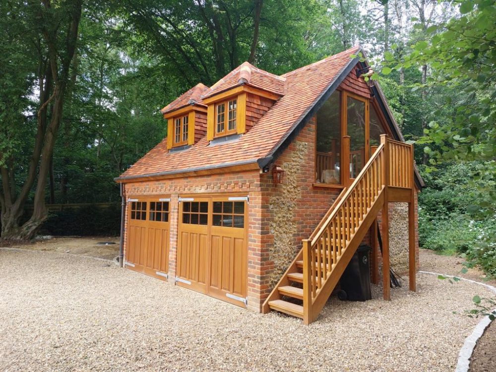 Pair of wooden Side-hinged doors installed to detached garage 1