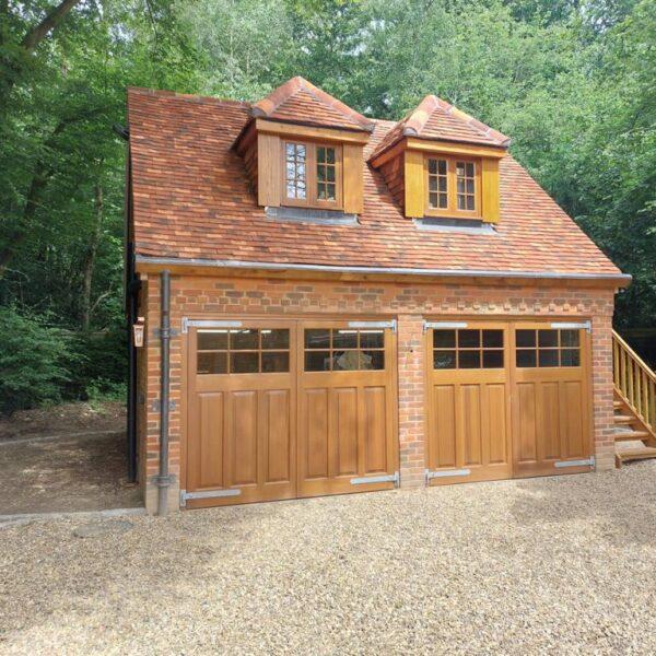 Front view of two wooden side-hinged garage doors