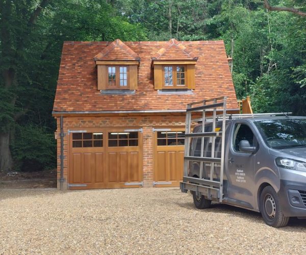 Pair of wooden Side-hinged doors installed to detached garage 5