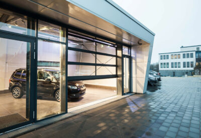 Glass garage door showing car parked