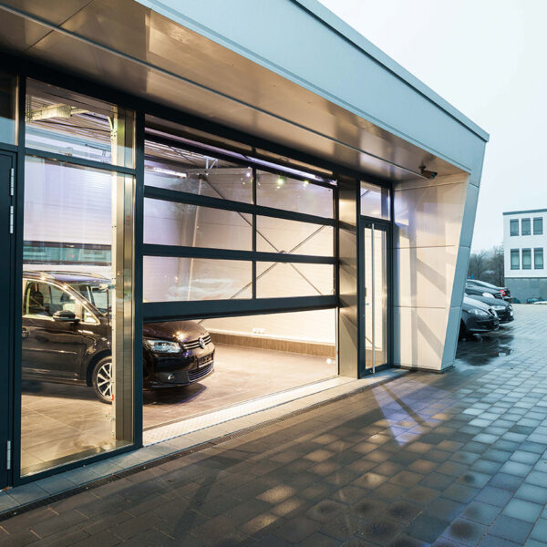 Glass garage door showing car parked