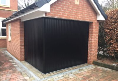 Sliding garage door in black