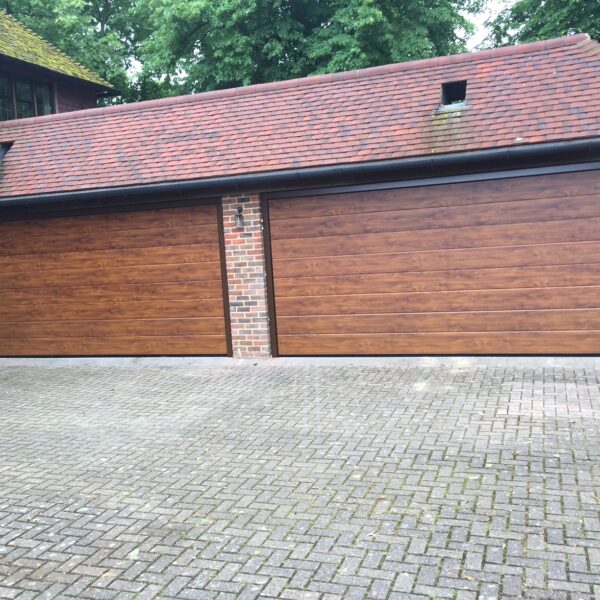 Double garage doors in oak - Doormatic Garage Doors
