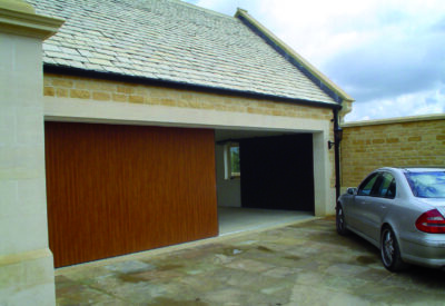 Wood Grain Vertico Sliding Garage Doors - Doormatic