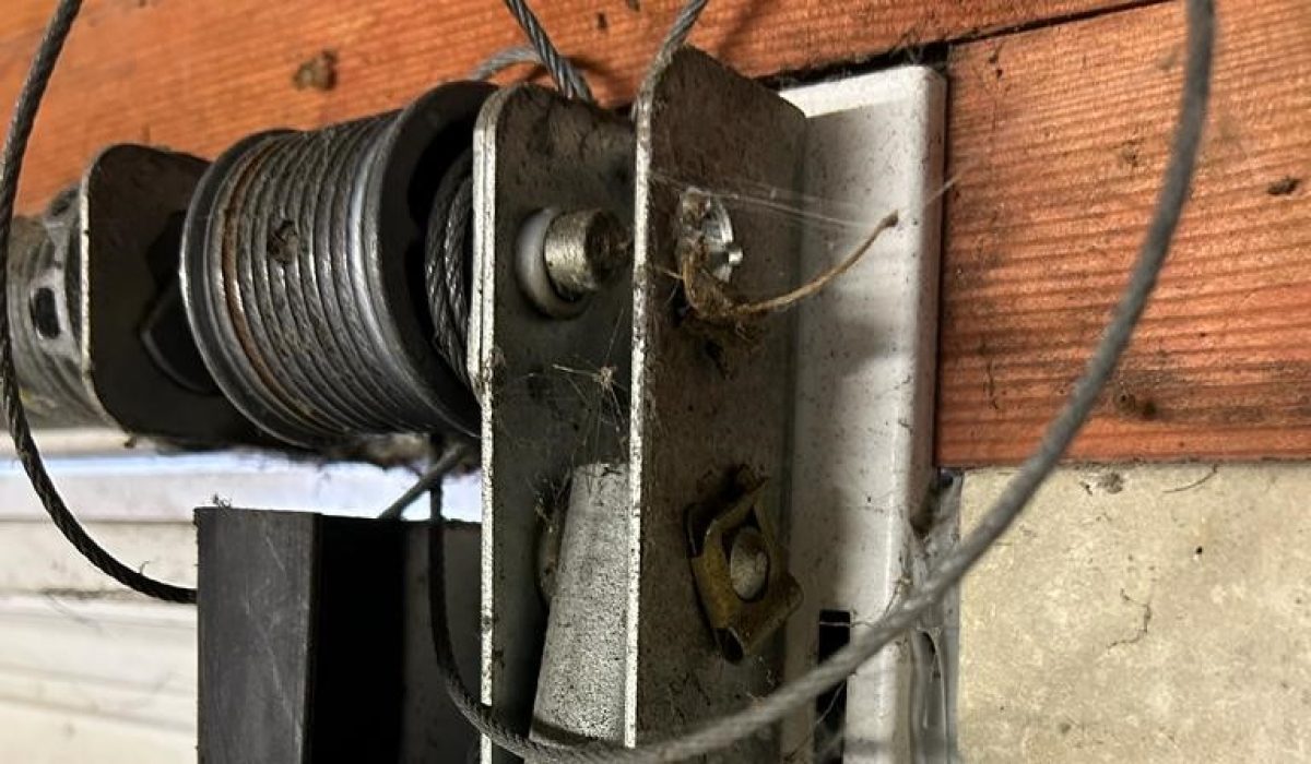 Is it safe to repair a garage door yourself?